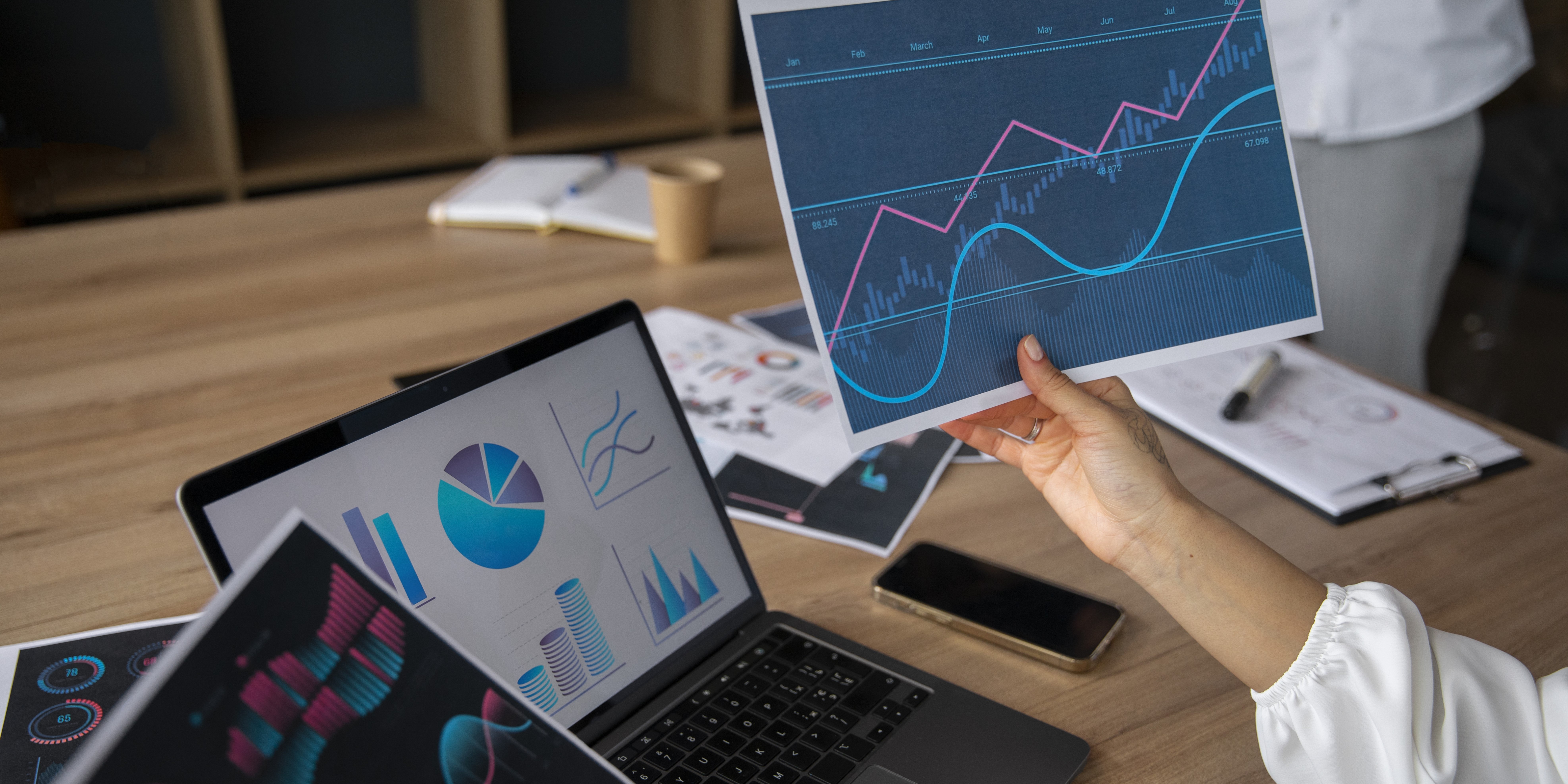 office-workers-using-finance-graphs